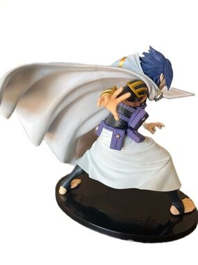 Anime Figure with White Cape & Purple Accents
